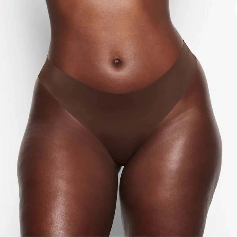 SKIMS Naked Intimates Seamless In Cocoa Brown Nude Thong Panty